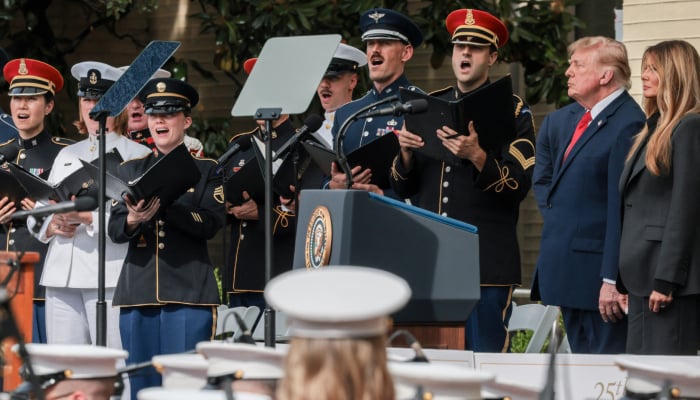 US President Donald Trump and First Lady Melania Trump listen to a choir singing during an observance ceremony marking the 25th anniversary of the September 11, 2001, attack on the Pentagon, in Washington, DC, September 11, 2026. — Reuters