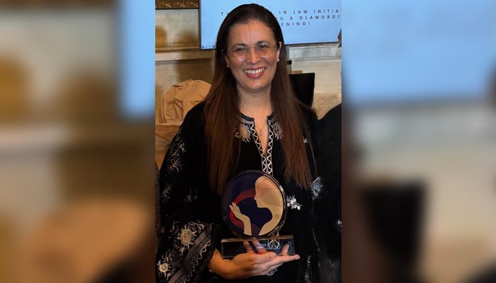 Supreme Court Judge Justice Ayesha A Malik poses with International Leader/Lifetime Award at Justitia Awards 2026 Gala in Vienna, Austria. — Supreme Court