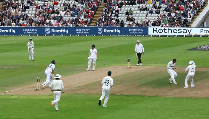 Pakistans Mohammad Ali celebrates after taking the wicket of Englands Joe Root before it is ruled out due to a no-ball delivery. — Reuters