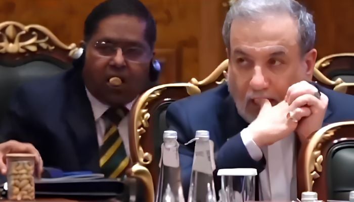 Indian Foreign Ministry spokesman Randhir Jaiswal (left) eats nuts during a Brics summit in New Delhi. — X@AlArabiya_Eng