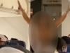 Female passenger removed from American Airlines flight after undressing midflight