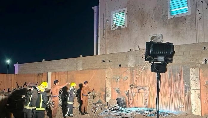 Members of security forces and emergency personnel inspect a damaged site in the aftermath of Houthi strikes, in a location given as Saudi Arabia, September 8, 2026.— Reuters