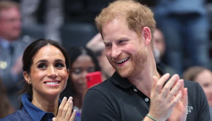 Prince Harry, Meghan laugh off royal drama in new appearance: Watch