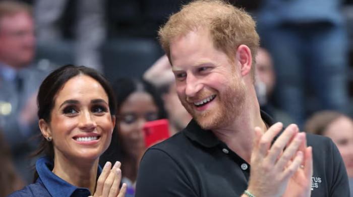 Prince Harry, Meghan laugh off royal drama in new appearance: Watch