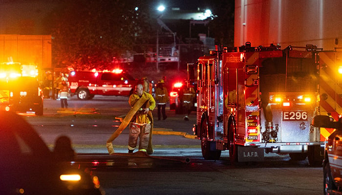 First responders work on the scene after a news helicopter crashed in Chatsworth, a suburban neighborhood of Los Angeles, California on September 15, 2026. — AFP