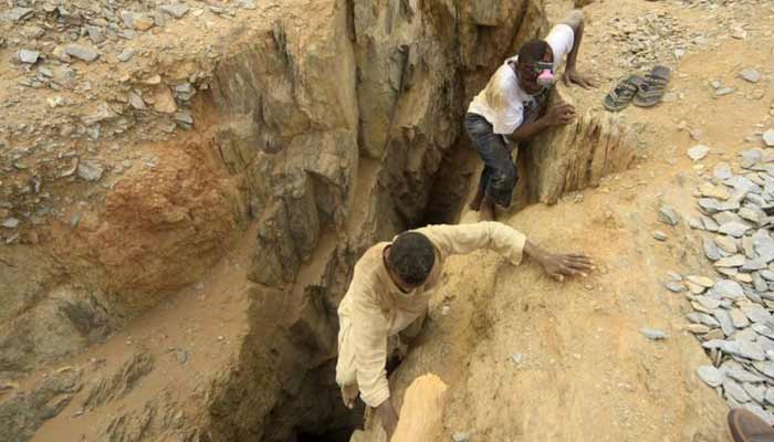 Gold mine workers climb out from a local mine in Al-Ibedia locality at River Nile State. — Reuters/File