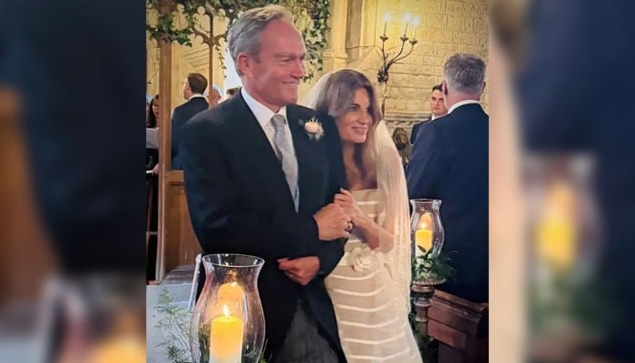 Jemima Goldsmith and Irish-Australian financier Cameron O’Reilly pose for a photo on their wedding day. — @Khanjemima/Instagram