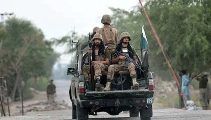 Pakistan Army personnel travelling on a military vehicle. — AFP/ File