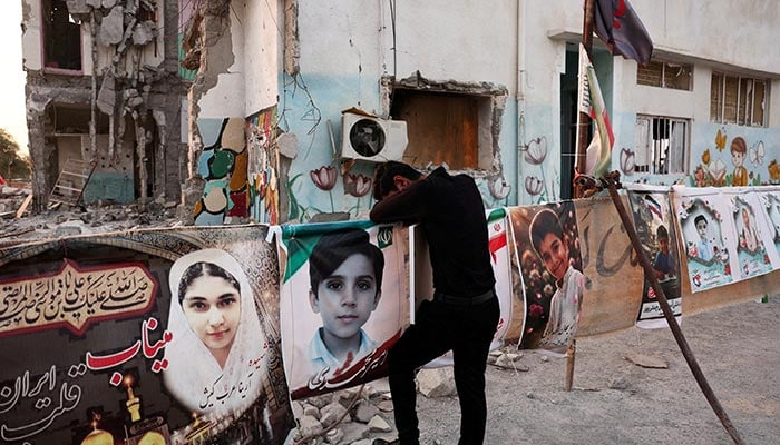 Masoud, an Iranian man who lost his son Mohammad Taha in the Minab school strike on February 28, reacts at the school in Minab, Iran, August 27, 2026. — Reuters