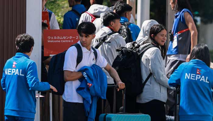 Members of Nepals delegation arrive at the athletes village ahead of the 2026 Asian Games in Nagoya, Aichi Prefecture on September 17, 2026.— AFP