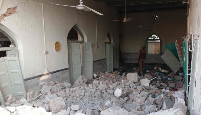 An army personnel walks amid the rubble following an explosion inside the police headquarters at Kohat in Khyber Pakhtunkhwa on September 18, 2026. — AFP