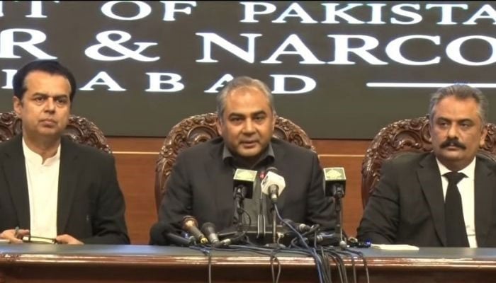 Interior Minister Mohsin Naqvi (centre) addresses a press conference in Islamabad on January 18, 2026. — YouTube/Geo News/screengrab
