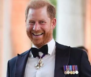 Prince Harry wipes away tear as he gives standing ovation to heroic Everest climber