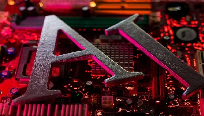 AI (Artificial Intelligence) letters are placed on computer motherboard in this illustration taken, June 23, 2023. — Reuters