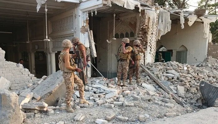 Army personnel stand amid the rubble following an explosion inside the police headquarters at Kohat in Khyber Pakhtunkhwa province on September 18, 2026. — AFP