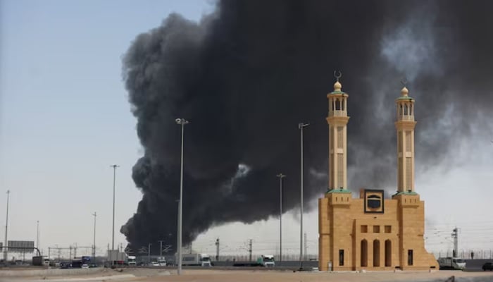 Smoke billows from a Saudi Aramco petroleum storage facility after an attack in Jeddah, Saudi Arabia, on March 26, 2022. —Reuters