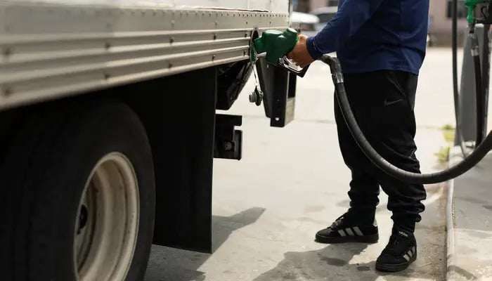 A worker fills his truck with diesel fuel at a corporate filling station in San Diego, California, US, May 18, 2026. — Reuters