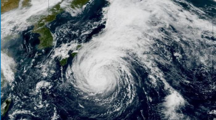 Japan on alert as Dujuan regains typhoon strength, with 1.6 million told to evacuate