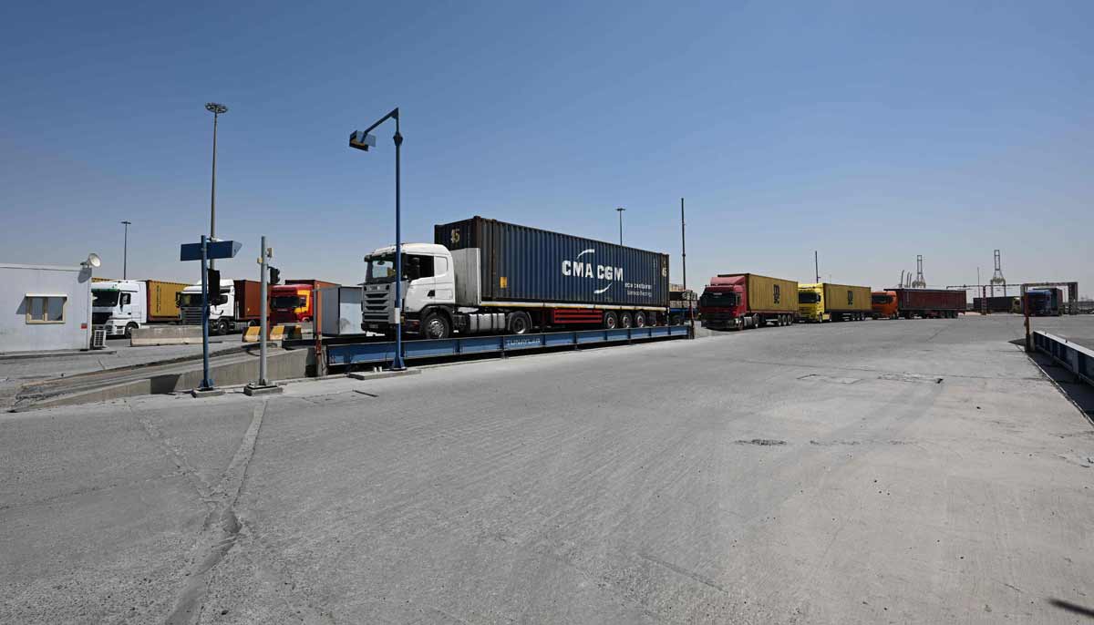 A queue of trucks waits at the weighbridge at the port of Umm Qasr in southern Iraq on September 17, 2026.— AFP