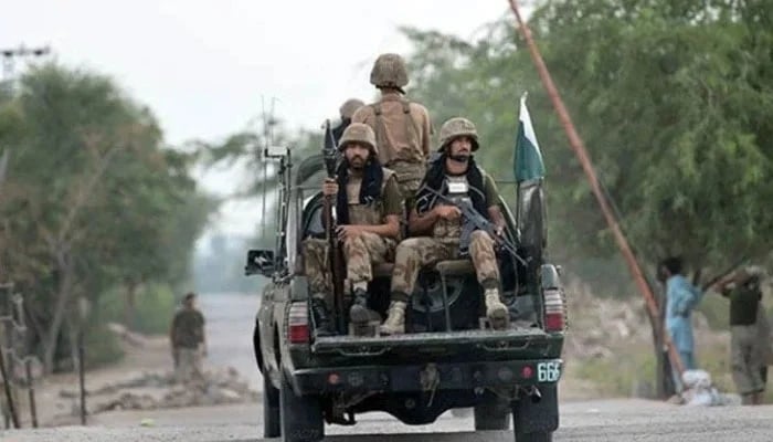 Pakistan Army personnel travelling on a military vehicle. — AFP/ File