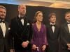 Prince William's velvet jacket catches Tom Cruise's eye as he reunites with David Beckham