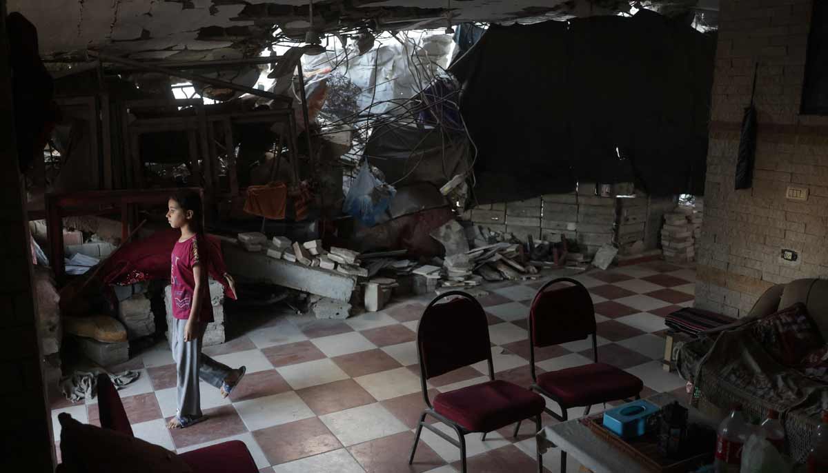 With reconstruction stalled, Gazans shelter in buildings at risk of collapse 30 A displaced Palestinian girl stands inside a heavily damaged building in Khan Yunis in the southern Gaza Strip on September 19, 2026. — AFP
