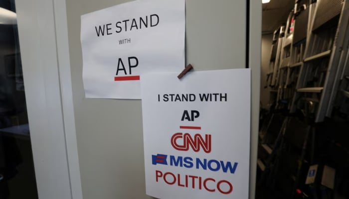 An updated solidarity sign adding CNN, MSNOW and POLITICO hangs outside the Associated Press booth at the White House grounds after US President Donald Trump banned three major news outlets – CNN, MS NOW and Politico from the White House, in Washington, DC, US, September 21, 2026. — Reuters