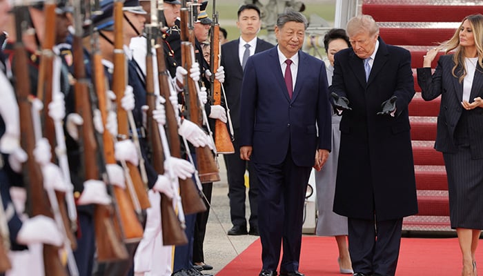US President Donald Trump shows the way to Chinese President Xi Jinping as he arrives ahead of a state visit at Joint Base Andrews, Maryland, US, September 23, 2026. — Reuters