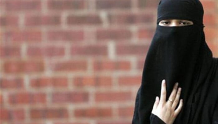 A representational image of a young girl wearing burqa. — Reuters