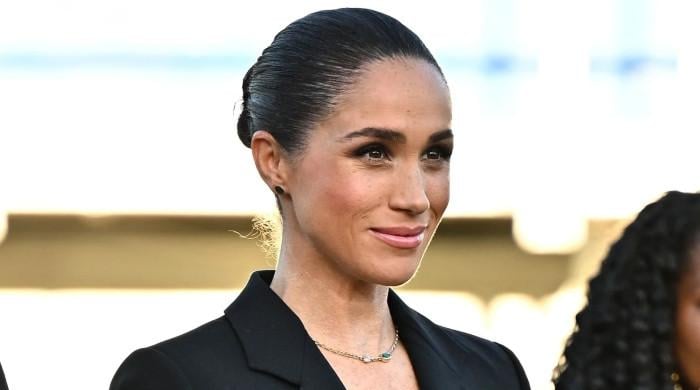 Meghan Markle 'teases' royal family in new video amid Spencer collab talks