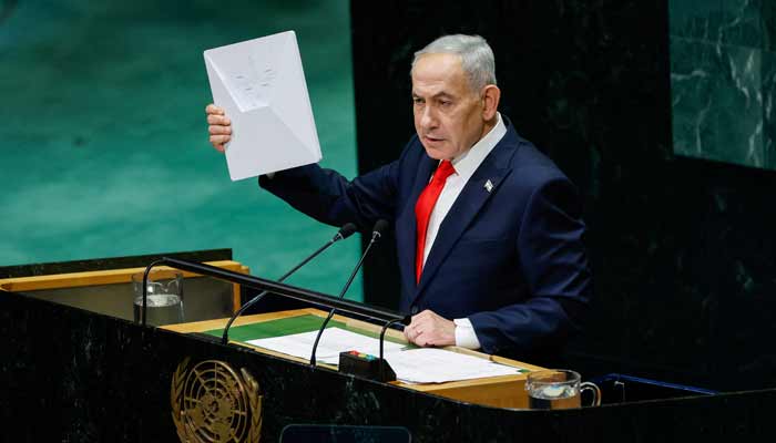 Israels Prime Minister Benjamin Netanyahu holds a Starlink device as he addresses the 81st United Nations General Assembly (UNGA) at UN headquarters in New York City, US, September 24, 2026.— Reuters