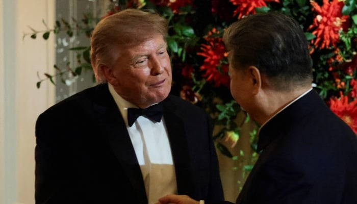 US President Donald Trump shakes hands with Chinese President Xi Jinping during a state dinner at the White House in Washington, DC, US, September 24, 2026. — Reuters