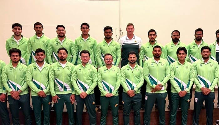 Pakistan squad poses for a group picture at the Jinnah International Airport in Karachi on September 24, 2026. — PCB