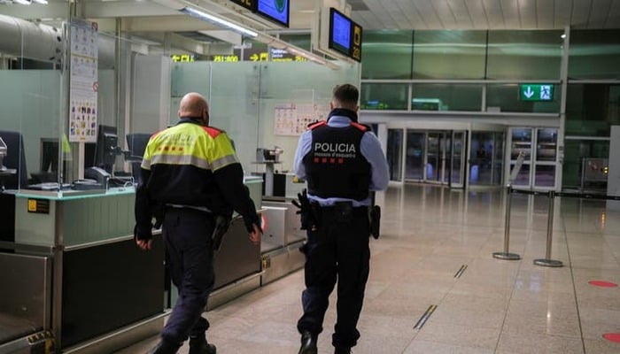 Representational image of police officers patrol at Josep Tarradellas Barcelona-El Prat Airport, in Barcelona, Spain, November 19, 2021. — Reuters
