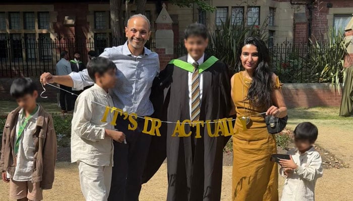 Areeba Hanif and her husband Omer Tariq pose for a group photo with their children. — Reporter/File