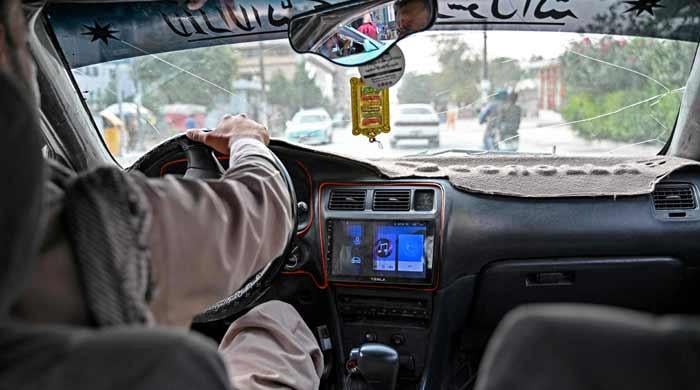 Rebellious Afghan taxi drivers defy ban on music