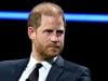 Prince Harry kisses ground after emotional skydive honouring 102-year-old veteran