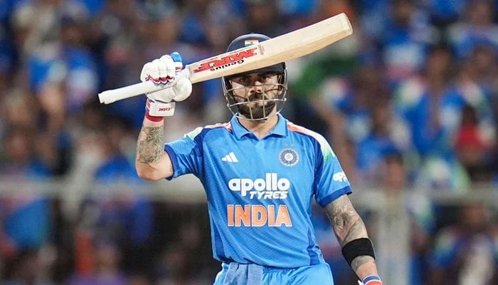 Indias Virat Kohli celebrates reaching his half-century during their first ODI against West Indies at the Greenfield International Stadium in Thiruvananthapuram on September 27, 2026. — BCCI