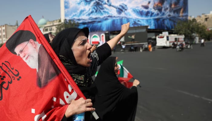 An Iranian woman shouts during a march in Tehran, Iran, September 25, 2026. — Reuters