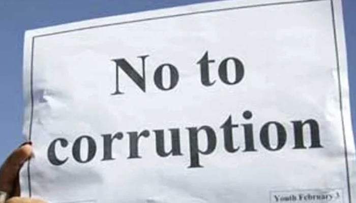 This representational image shows No to corruption on a placard. — Reuters/File