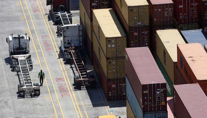 China, US agree tariff cuts on $60bn of goods including agriculture, household items 8 Workers stack empty shipping containers for storage at Wando Welch Terminal, operated by the South Carolina Ports Authority in Mount Pleasant, South Carolina, US May 10, 2018. — Reuters