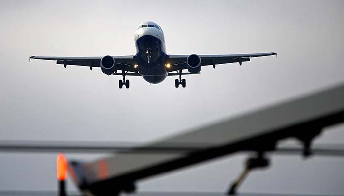 A file photo shows, an aeroplane prepares to land at an irport. — Reuters
