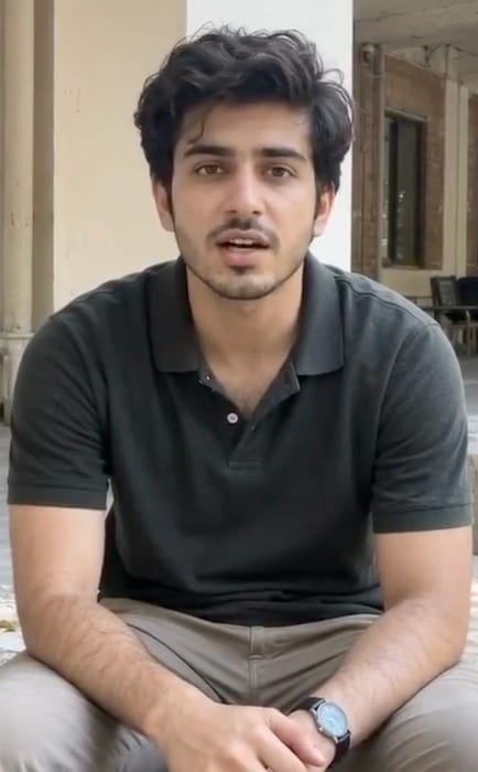 The appearance of the mans watch changes as the video progresses