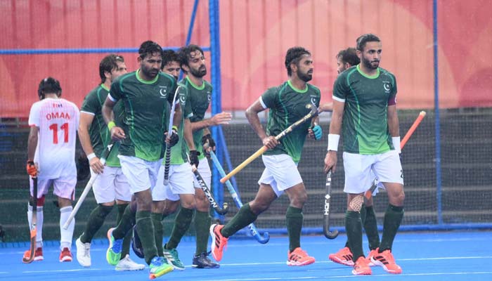 Pakistan hockey team players in action during match against Oman at Asian Games 2026. — Reporter