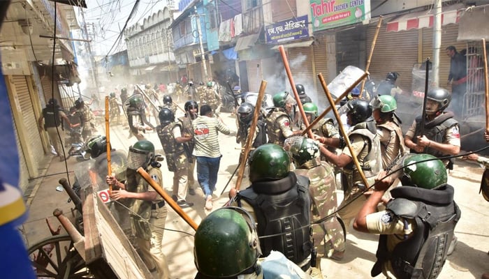 Indian police seen baton charging on protesters amid Ujjain mosque demolition. NDTV