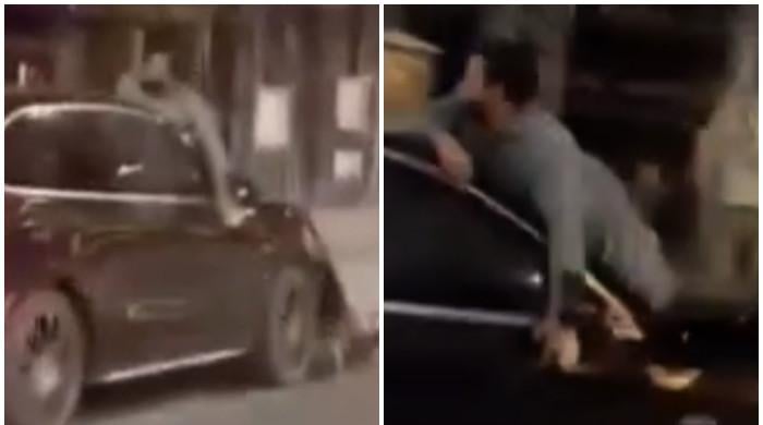 WATCH: Driver's reckless act leaves motorcyclist on car bonnet in Rawalpindi