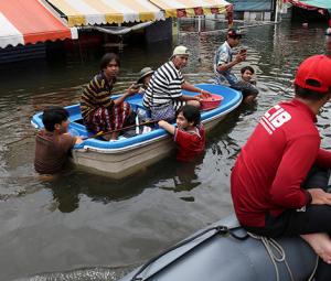 Thousands huddle in Bangkok shelters as Thai flood damages seen at $320m