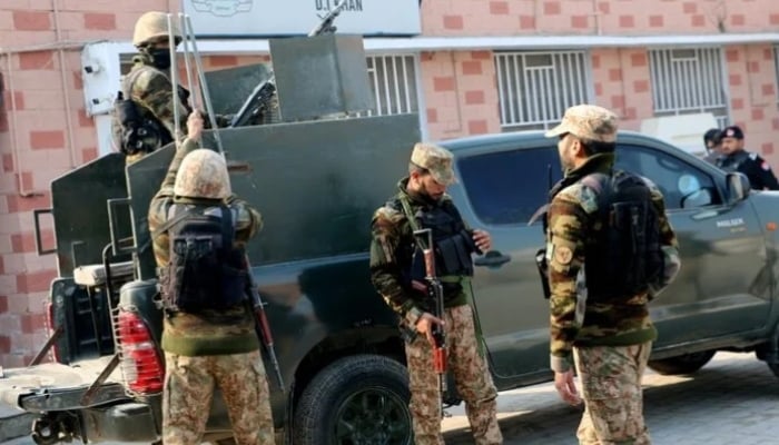 Security personnel stand guard outside a hospital in Dera Ismail Khan, Khyber Pakhtunkhwa. — Reuters/File