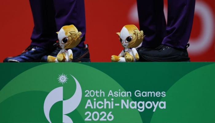 Gold medallists Kazakhstans Ruslan Kurbanov, Vadim Sharlaimov, Kirill Prokhodov and Yerlik Sertay celebrate on the podium after winning the Mens Team Epee at the Aichi International Exhibition Center, Tokoname, Japan, September 27, 2026. — Reuters