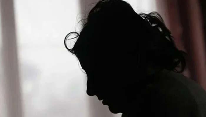 This representational image shows a silhouette of a woman. — AFP/File